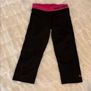 Black and pink Nike leggings